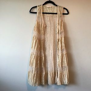 Beautiful lace vest .
